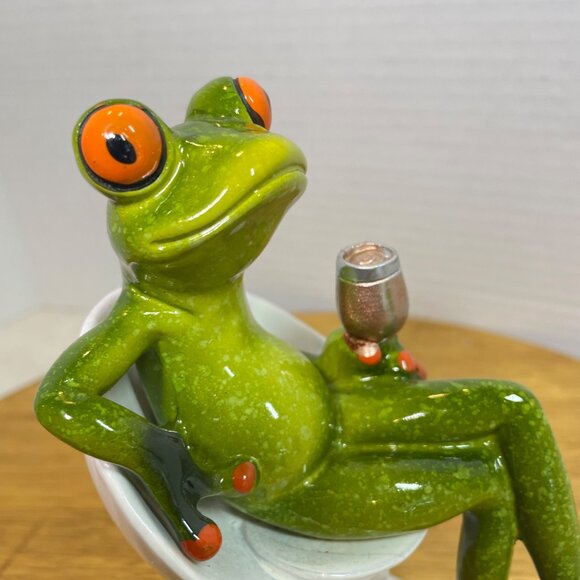 Green Ceramic Frog Figurine With Wine Glass Sitting In Modern White Chair - Picture 4 of 10